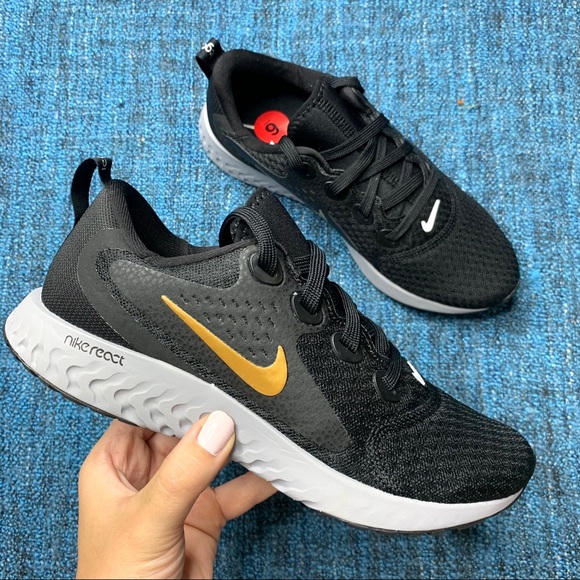 nike legend react black gold